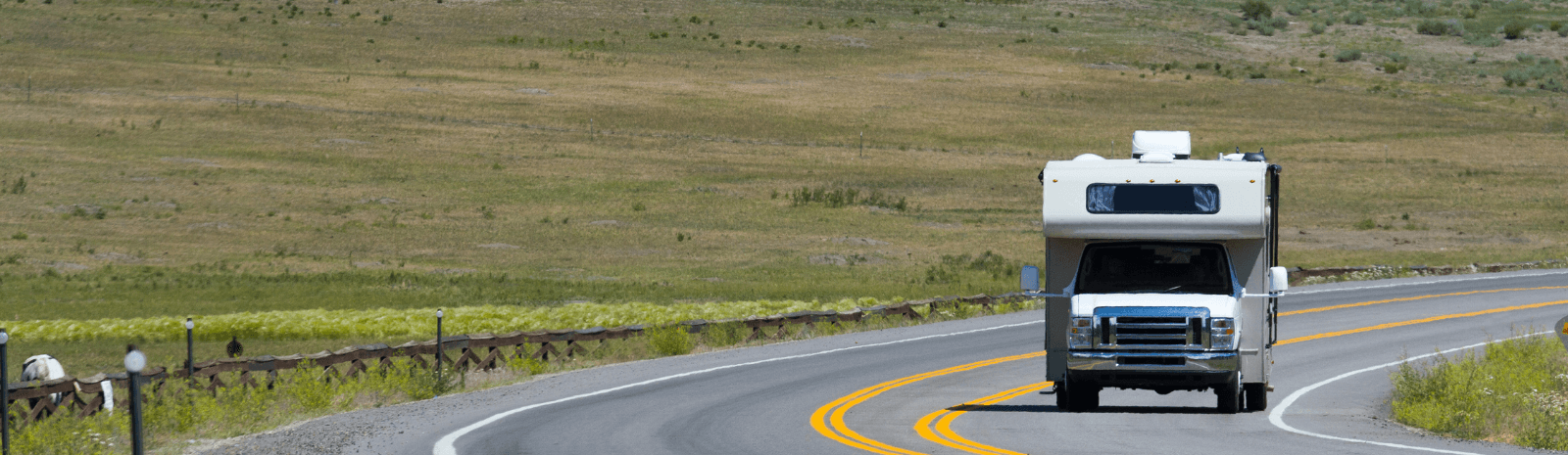 Motorhome driving down highway in the countryside